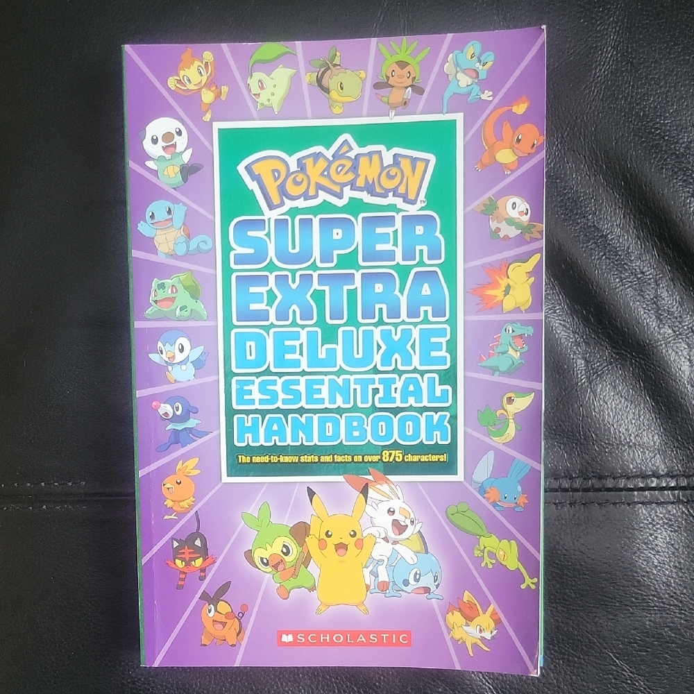 Scholastic Pokémon Super Extra Deluxe Essential Handbook / Book - Like New